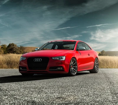 Superbe Audi A5 rouge dans un paysage pittoresque