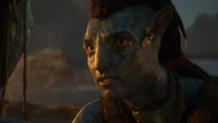 Jake Sully in a heartfelt moment with a Na'vi character from "Avatar: The Way of Water" (2022).