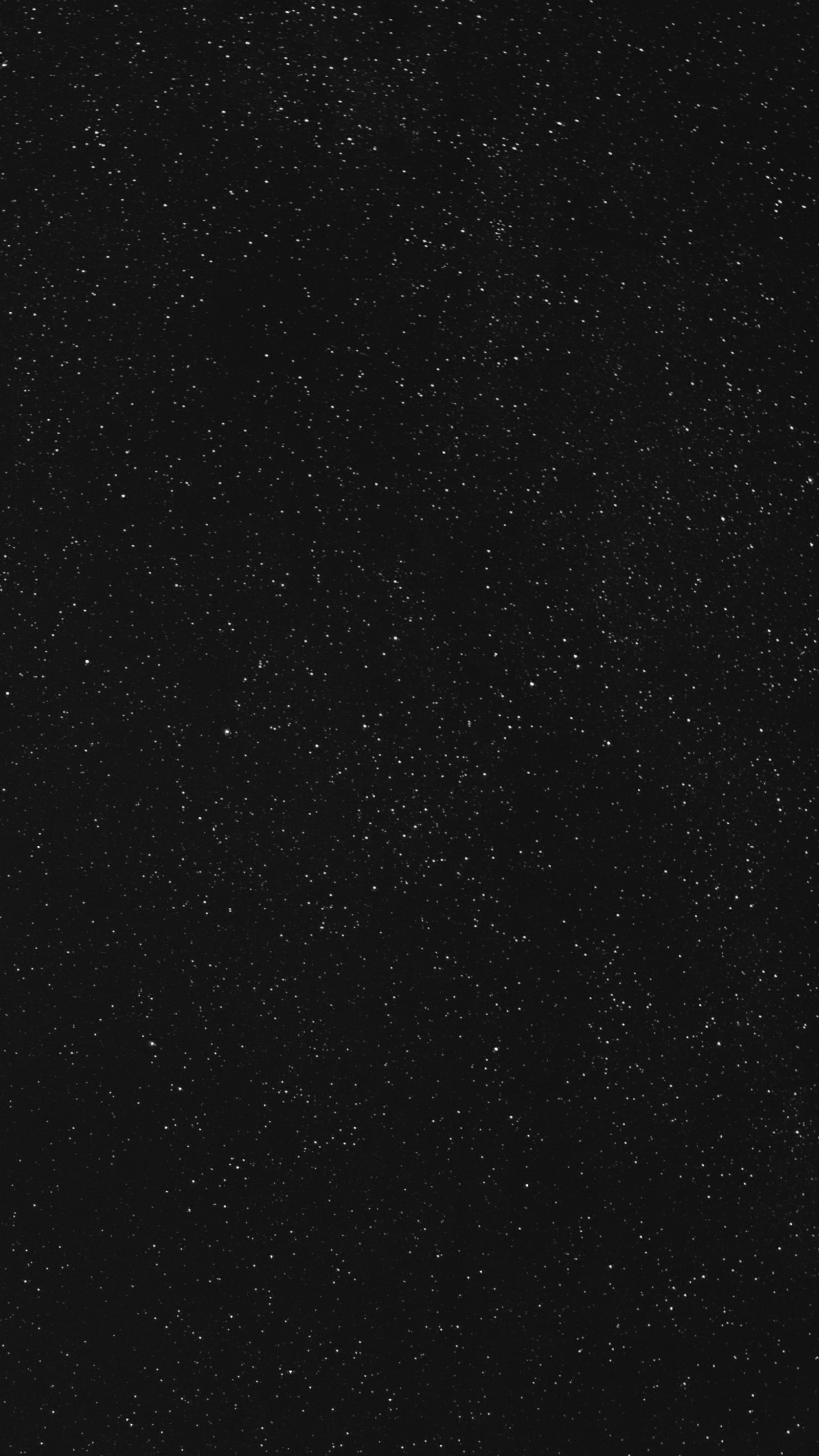 A close up of a black sky with a few stars (black, midnight, milkyway, stars, twinkling)