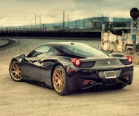 Sleek Black Ferrari 458 with Gold Rims in Industrial Setting