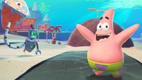 Patrick Star Celebrates in Bikini Bottom: A Scene from 'SpongeBob SquarePants: Battle for Bikini Bottom Rehydrated'