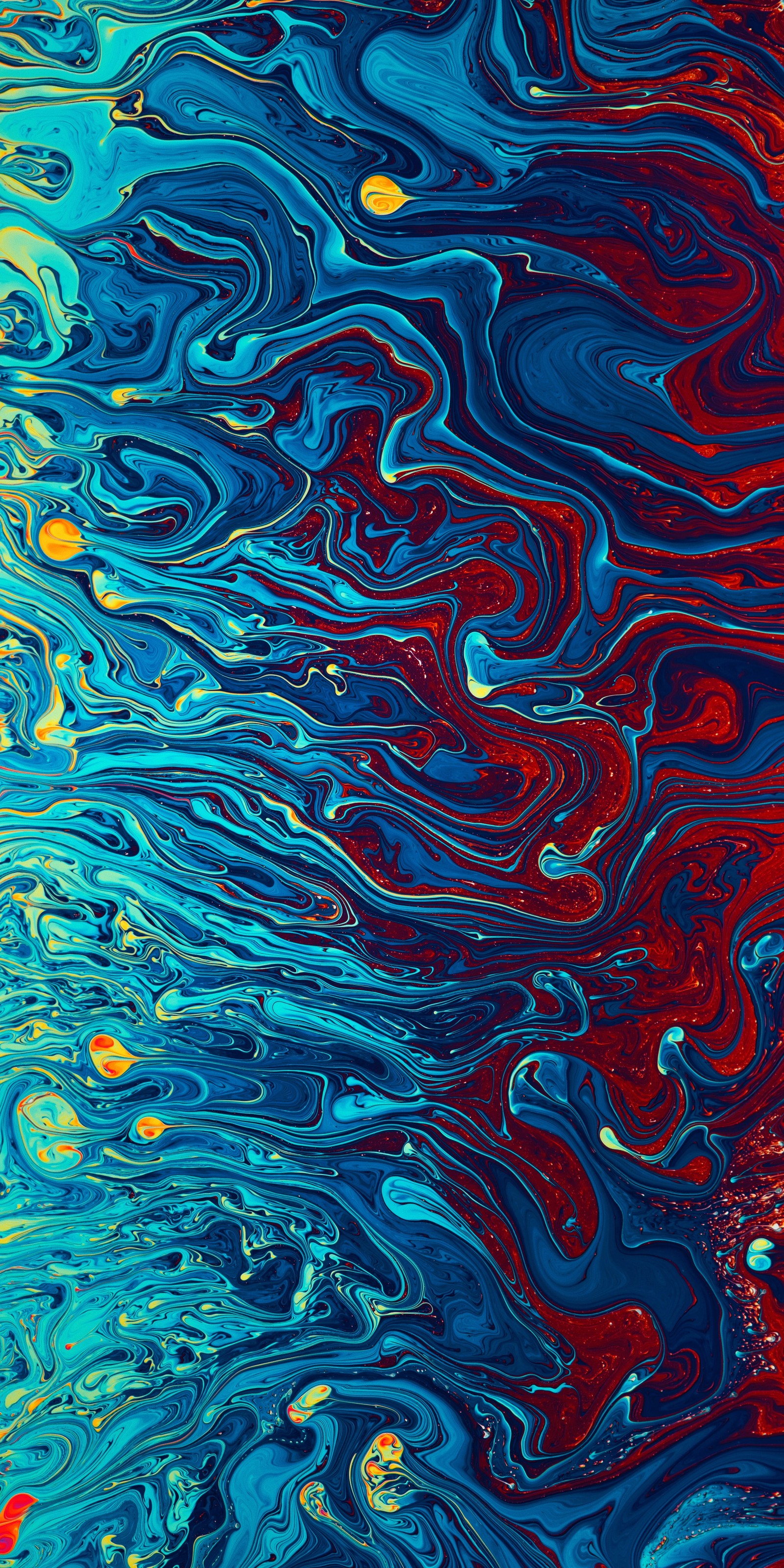 A close up of a colorful liquid painting on a surface (water, acrylic paint, visual arts, painting, abstract art)