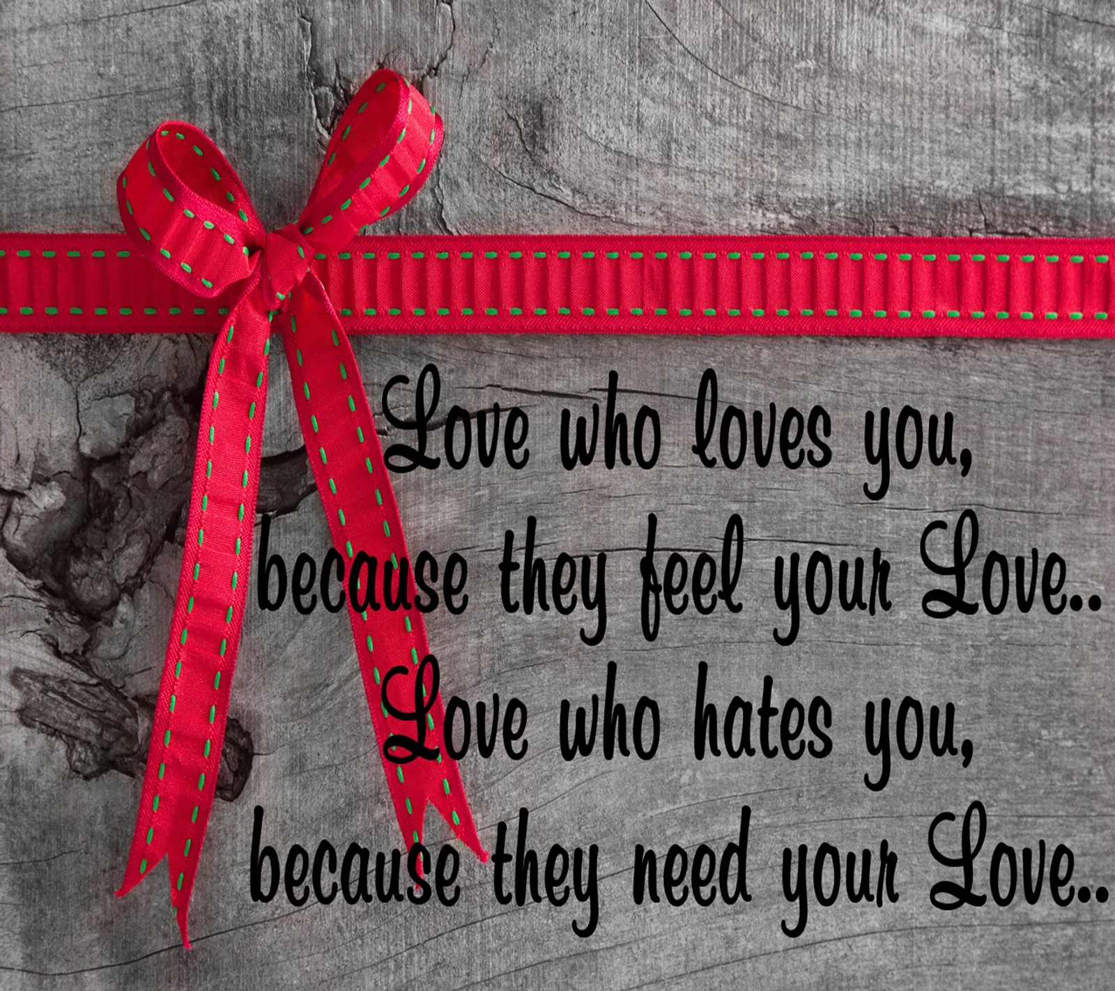 There is a red ribbon tied to a wooden sign with a quote (life, love, love who loves you, saying)