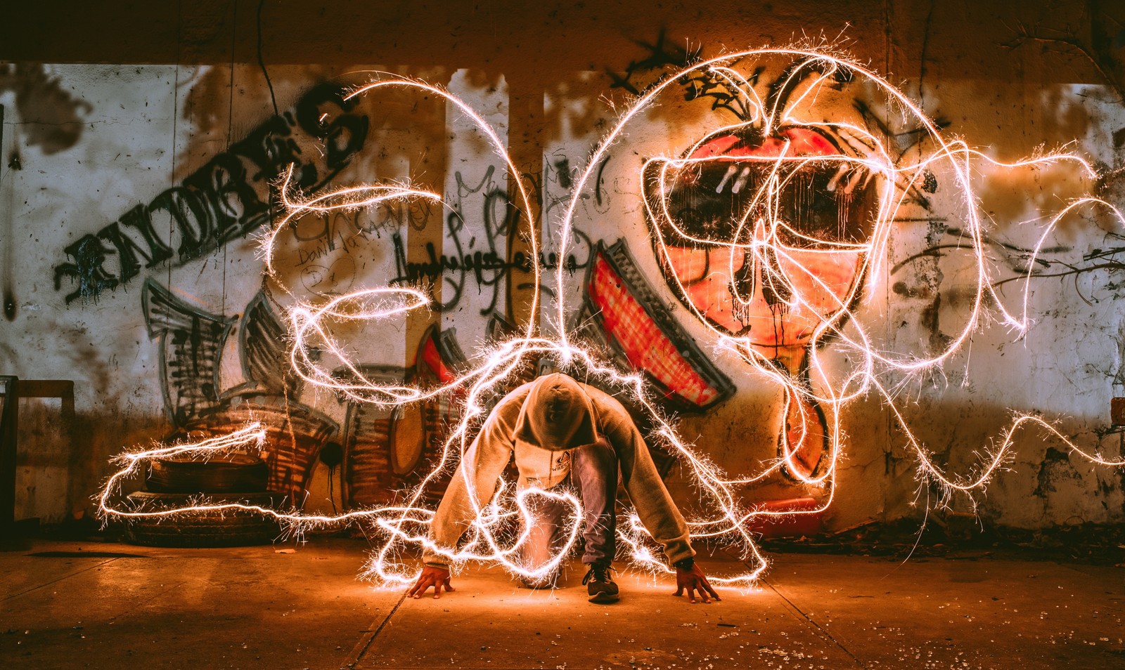 A woman sitting on the ground with a light painting on her face (graphic design, art, graphics, visual arts, neon)