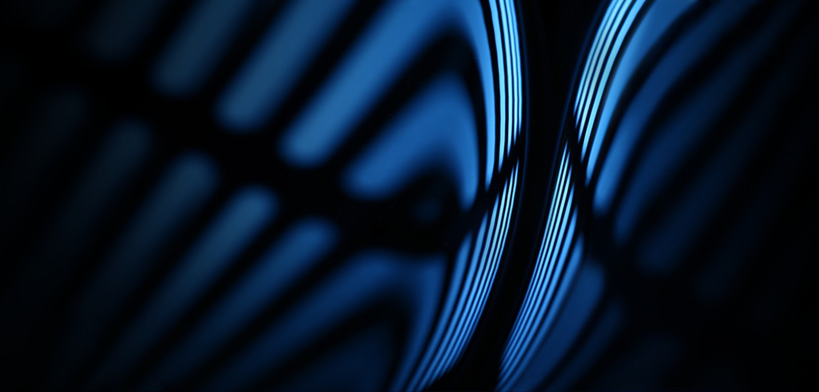 A close up of a clock with a blue light in the background (dark abstract, stock, vivo nex, abstract, blackdark)