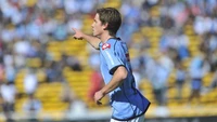 Soccer Player Directing Play in Competitive Tournament