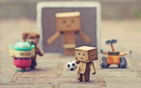 Danbo jogando futebol com amigos