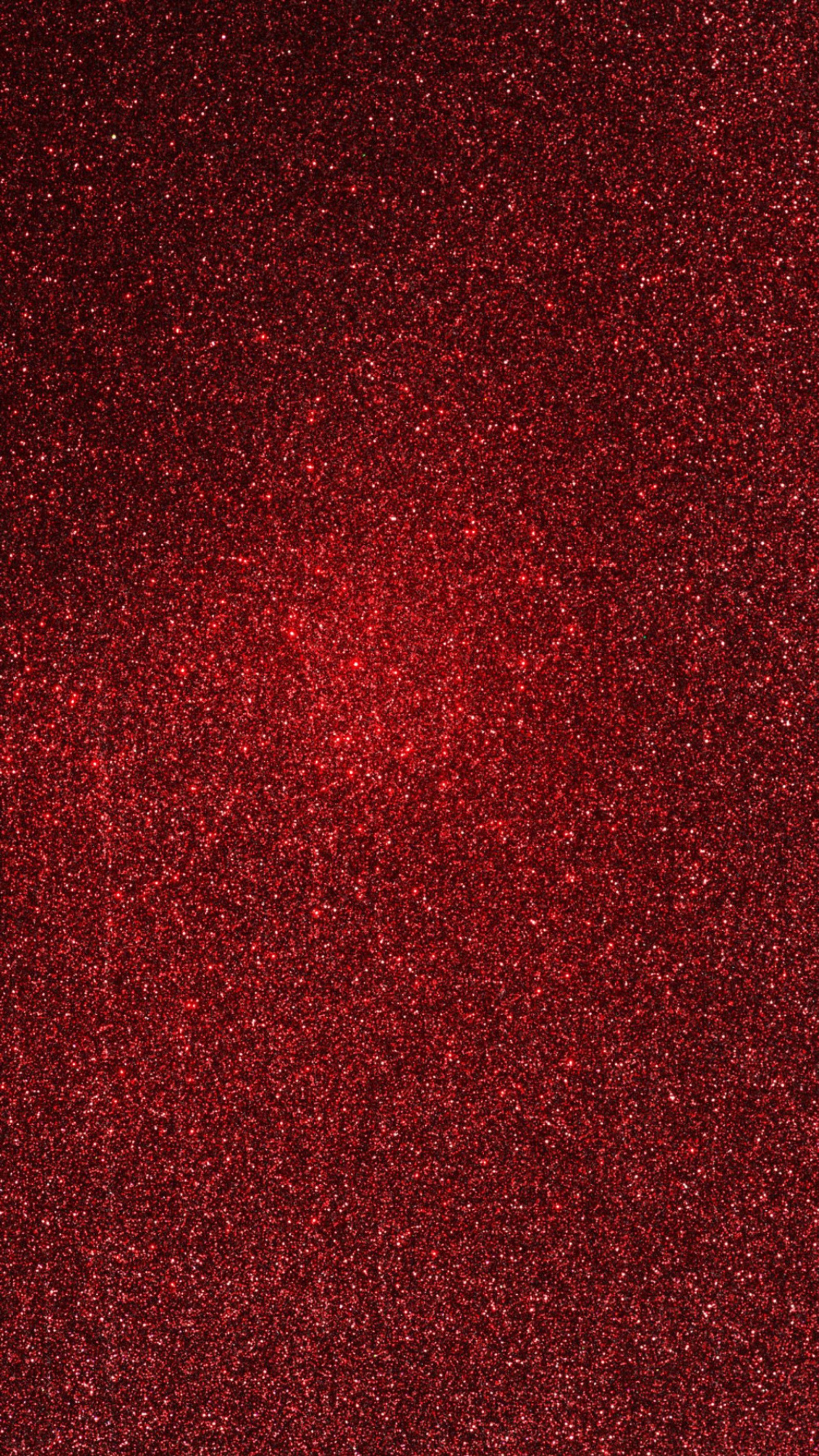 Un gros plan d'un fond pailleté rouge sur un fond noir (paillettes, hd, rouge)