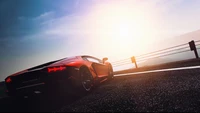 Lamborghini Aventador in einer Sonnenaufgangslandschaft.