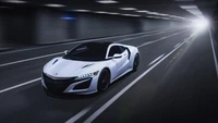 Elegante Acura NSX em movimento através de um túnel moderno