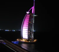 Burj Al Arab Illuminated at Night in Abu Dhabi