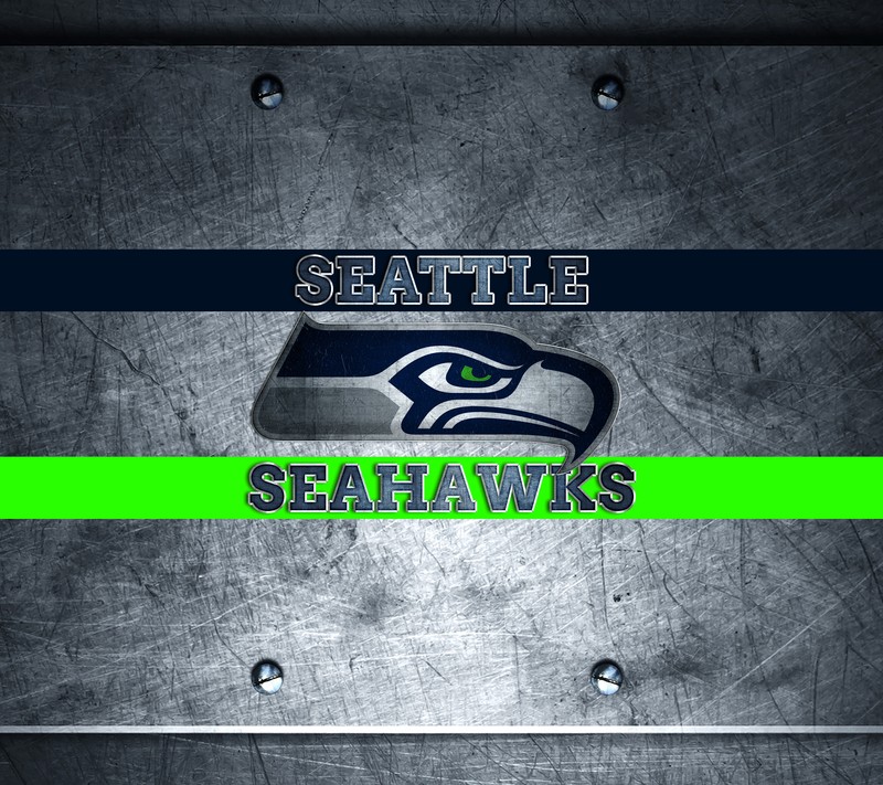 Крупный план логотипа seattle seahawks на металлической пластине (12s, футбол, го хоукс, gohawks, я в деле)