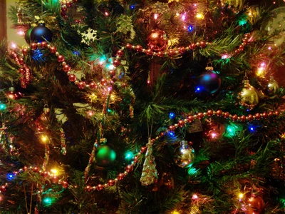 Vibrant and Festively Adorned Christmas Tree with Colorful Ornaments and Lights