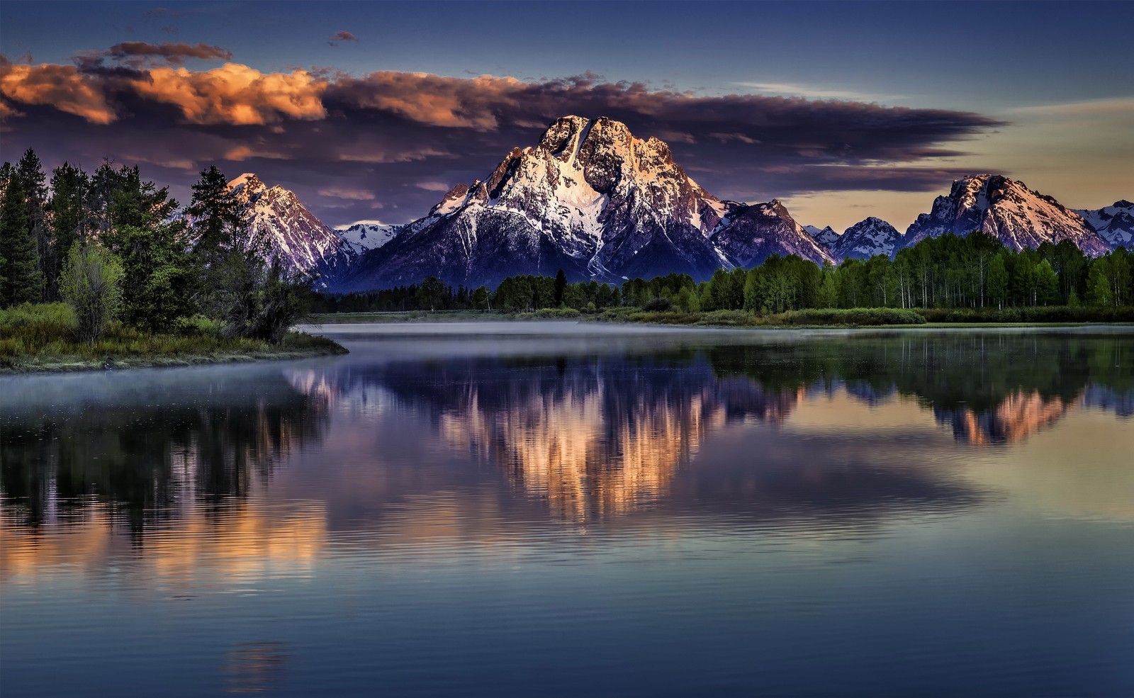 Uma vista de um lago com montanhas ao fundo (parque nacional grand teton, rio snake, reflexo, natureza, montanha)