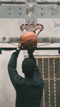 Focused Shooter Aiming for the Hoop