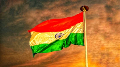 Indian Flag Against a Vibrant Sunset Sky