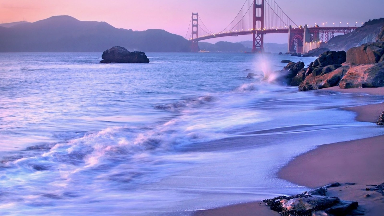 Arafed view of a bridge and a body of water with waves (golden gate bridge, baker beach, bridge, sea, wave)