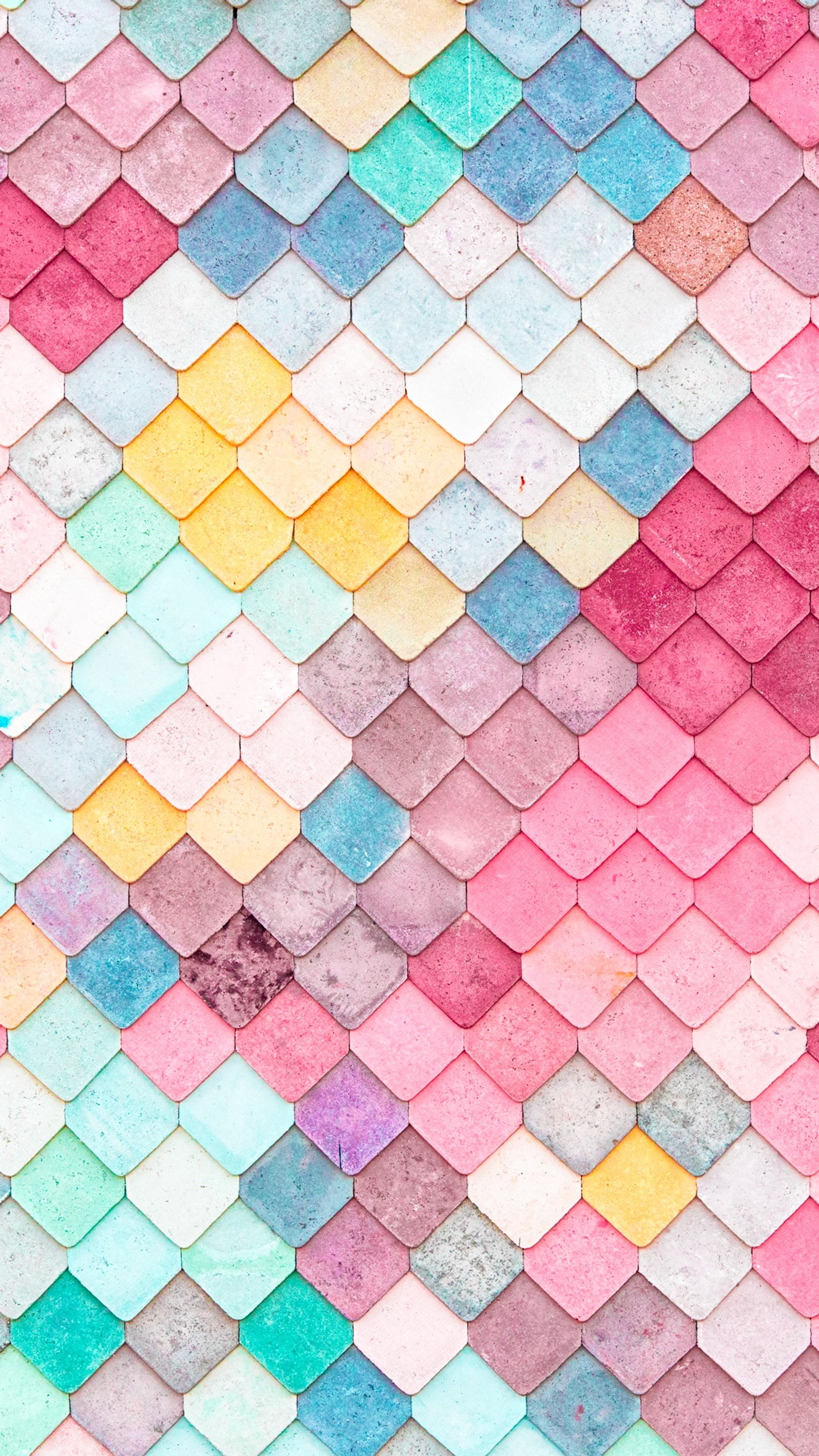 A close up of a colorful tiled wall with a pattern (apple, colourful, iphone, plus, tiles)