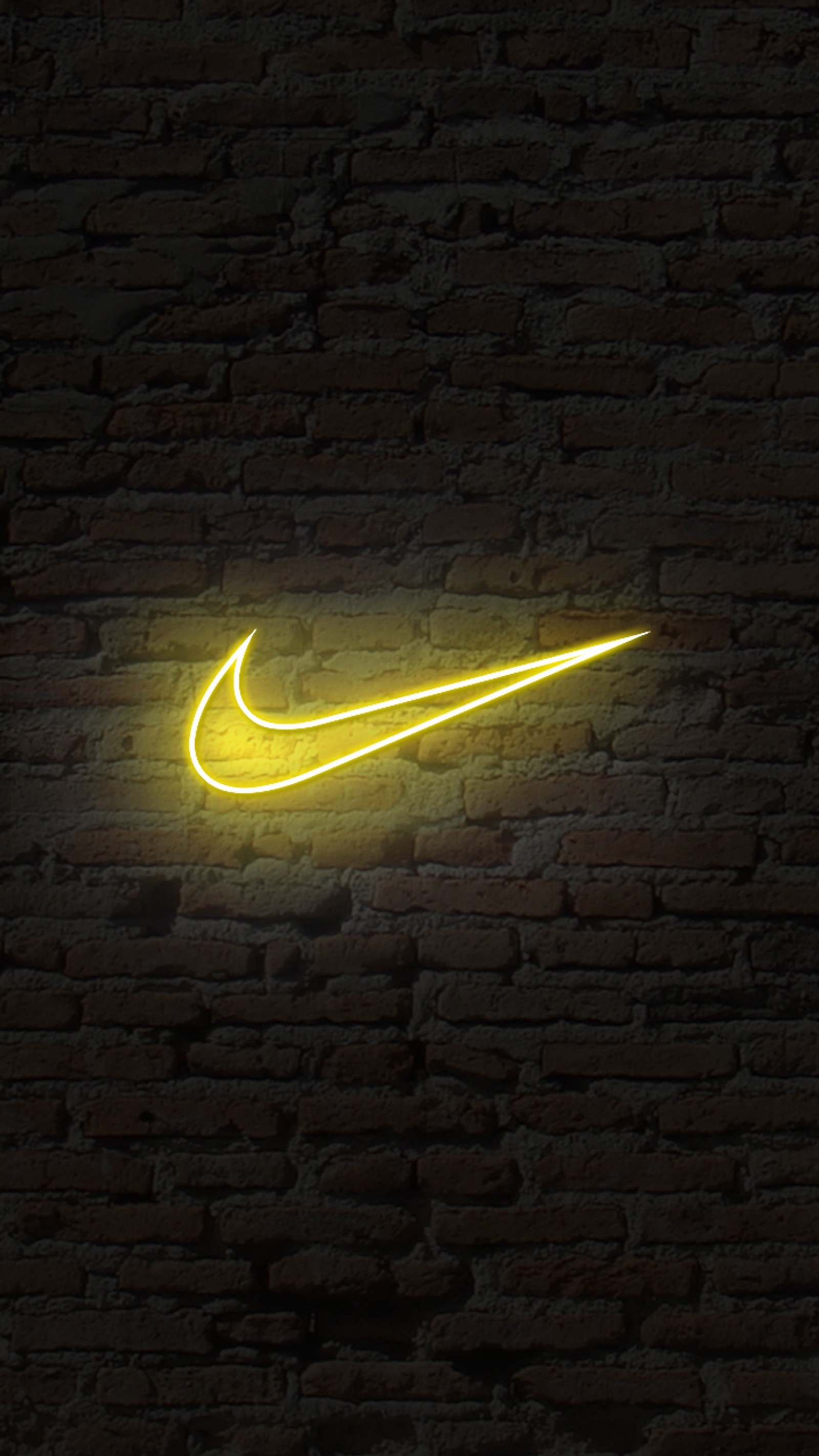 Logotipo de nike en neón amarillo en una pared de ladrillo (aeyazc, logotipo, neón, nike, logo de nike)