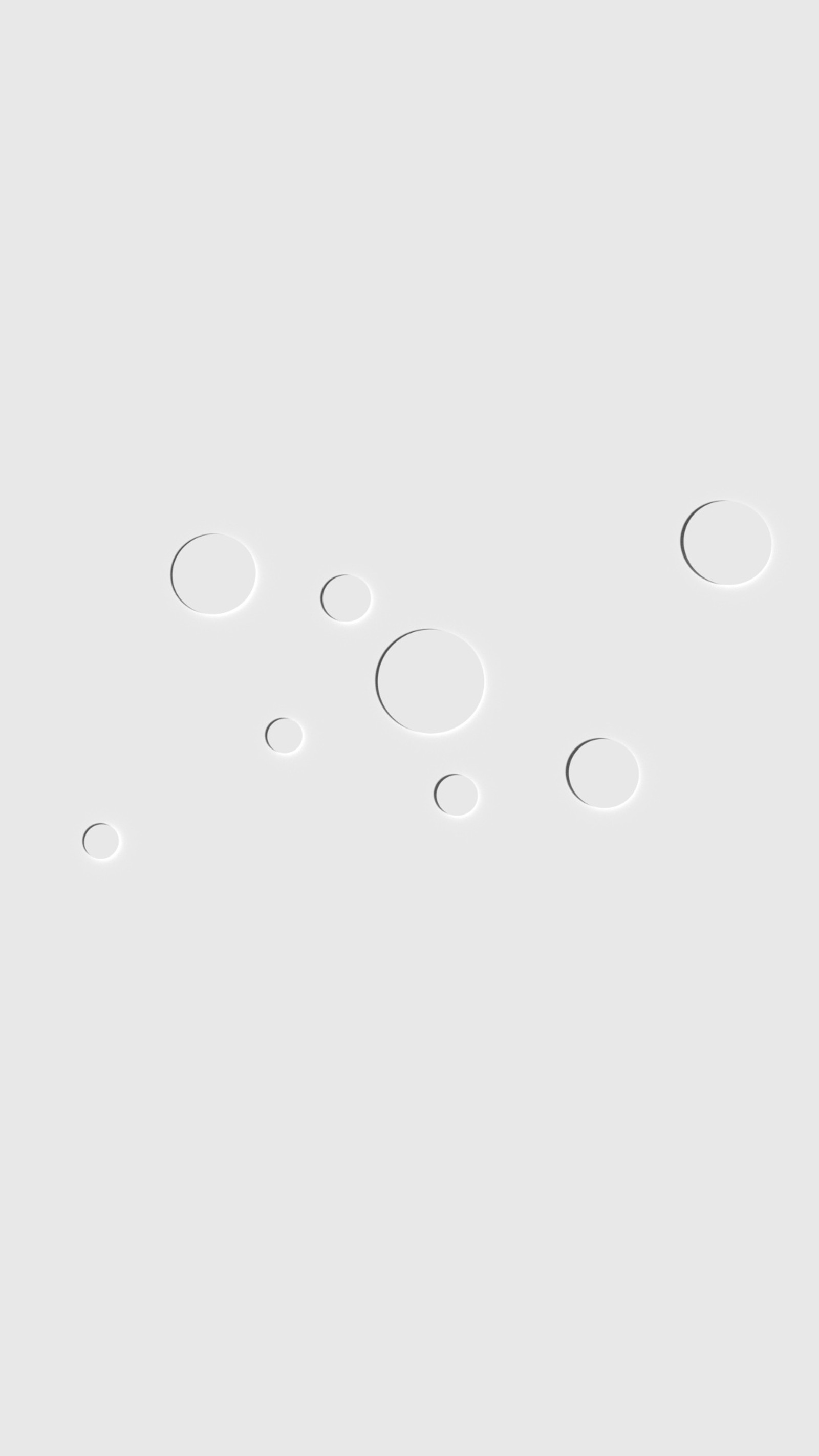 There are many circles of white soap bubbles floating on a white surface (abstract, circles, design, material, monochrome)