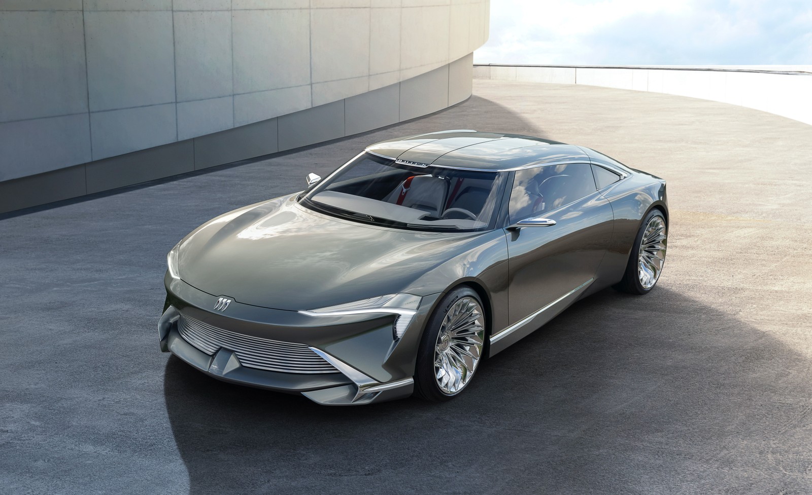 Серебряный автомобиль припаркован перед зданием (buick wildcat ev concept, электромобили, 2022, 5k, 8k)