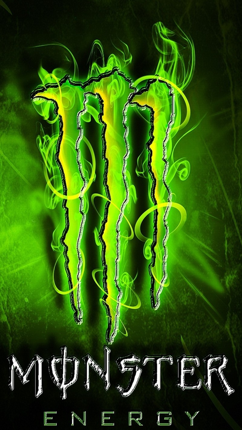 Крупный план логотипа monster energy drink на зелёном фоне (логотип, монстр)