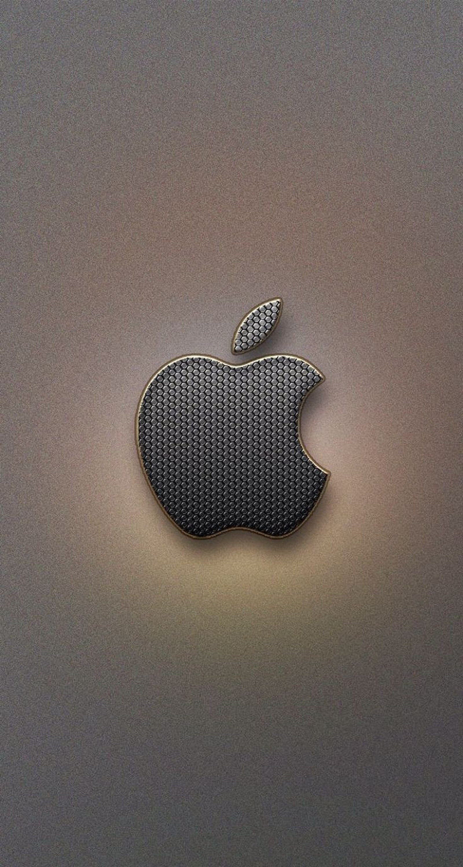 There is a shiny apple logo on a shiny surface (air, broken, cavaliers, eyad, gold)