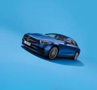 2021 Mercedes Benz CLS 350 AMG Line on a Vibrant Blue Background - 4K Wallpaper