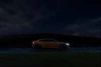 Lamborghini Urus sous un ciel étoilé