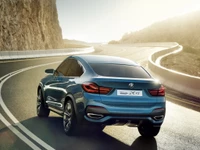 BMW X4: A Luxurious Personal Car on a Scenic Road