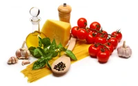 Ingrédients frais pour le délice de pâtes italiennes : tomates, ail, basilic, huile d'olive, fromage et spaghetti.