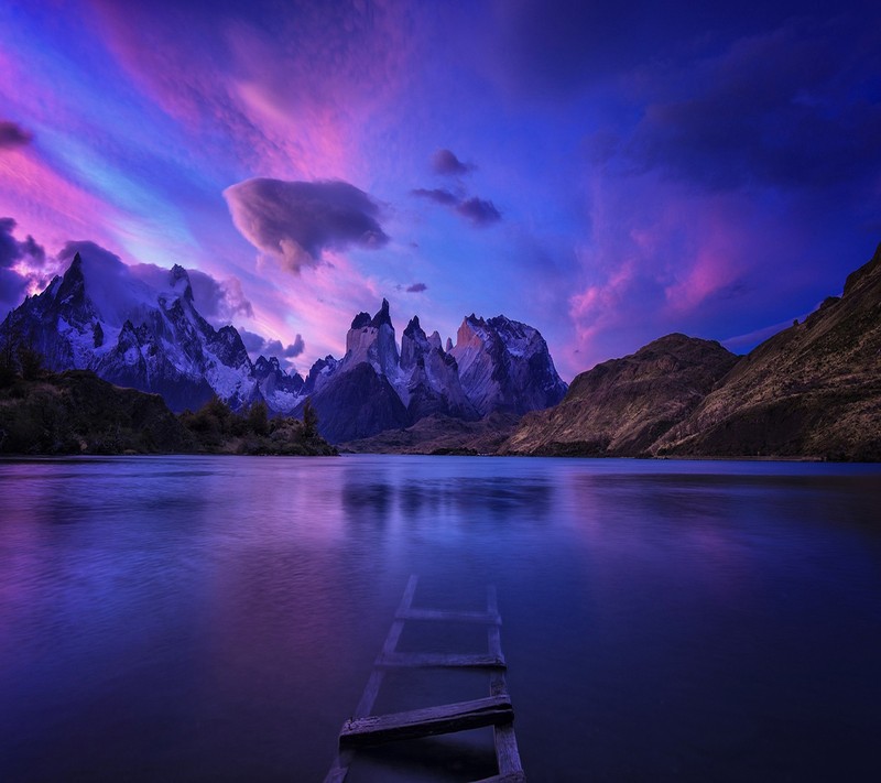 Arafed boat on a lake with mountains in the background (beautiful, landscape)