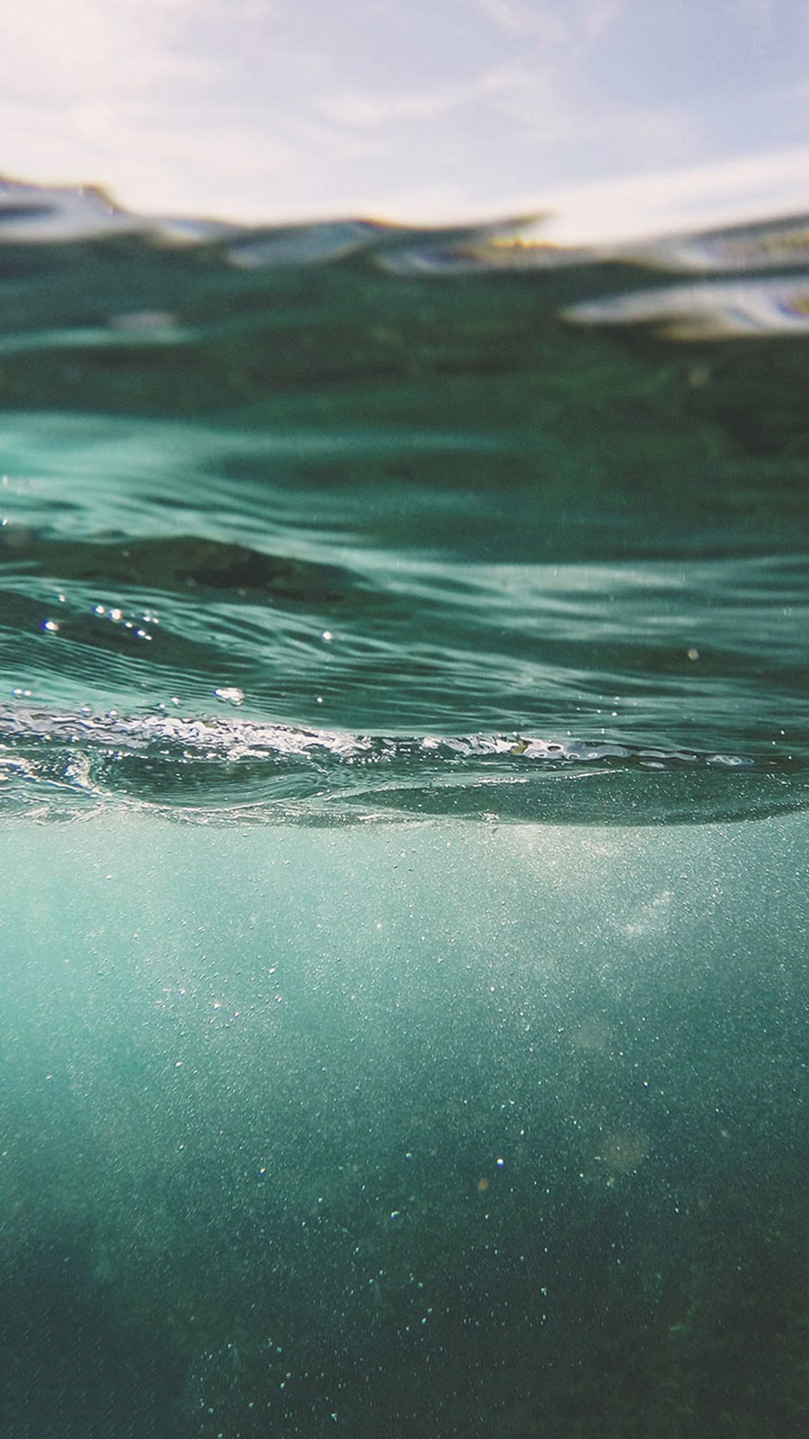 There is a picture of a wave coming in to the ocean (ocean, sea)