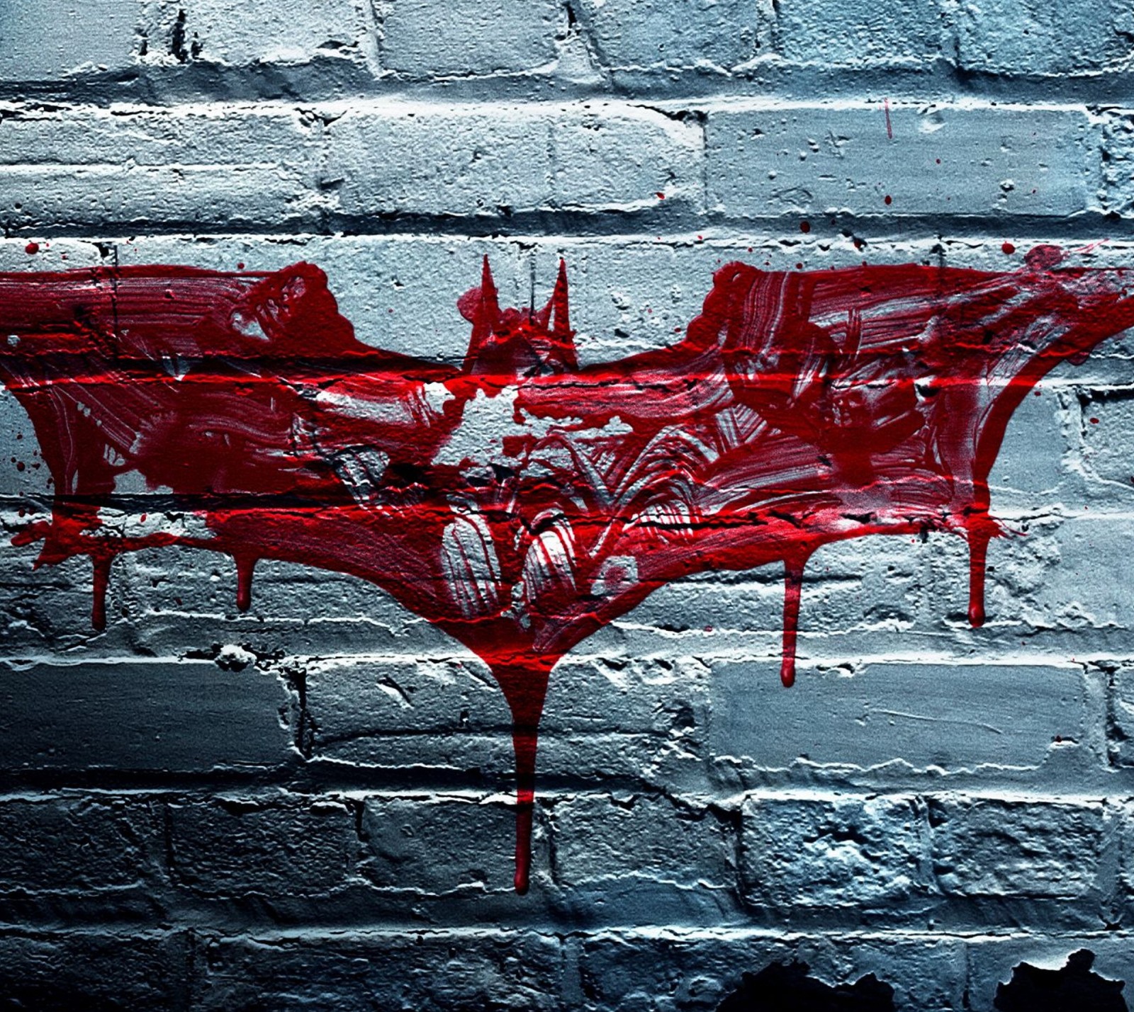 Batman logo on a brick wall with blood dripping down (dark knight, logo)