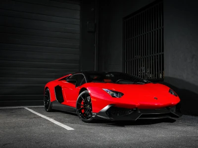 Red Lamborghini Aventador S showcasing sleek automotive design in an urban setting.