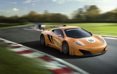 McLaren F1 GTR Racing on Track: A Stunning Orange Supercar in Action