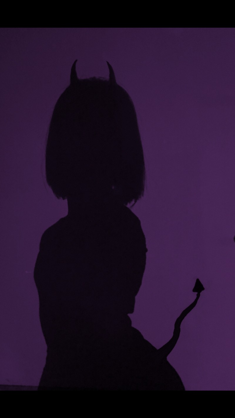 Purple background with silhouette of a woman holding a small bird (aesthetic, demond, girl, grunge, purple)