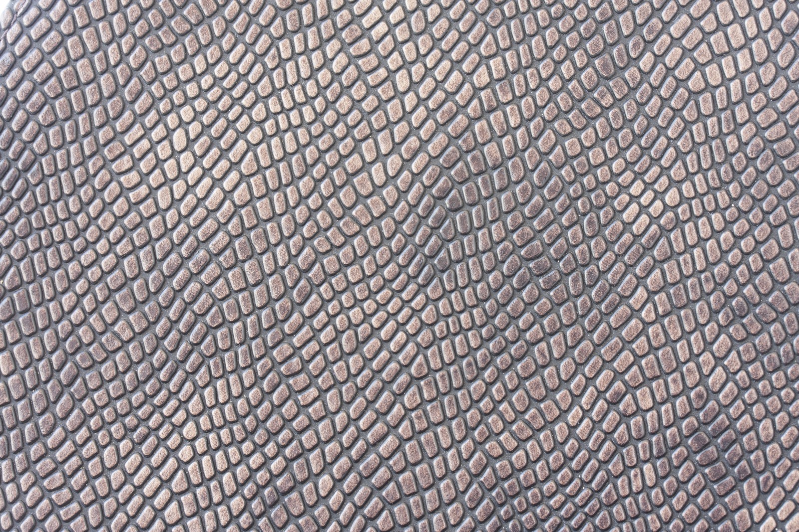 A close up of a black and white snake skin pattern (textile, pattern, material, design, pebble)