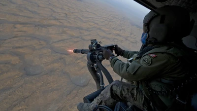 Canadian Soldier Engaged in Aerial Reconnaissance with Firearm