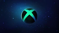 Логотип Xbox на темно-синем фоне с футуристическим свечением