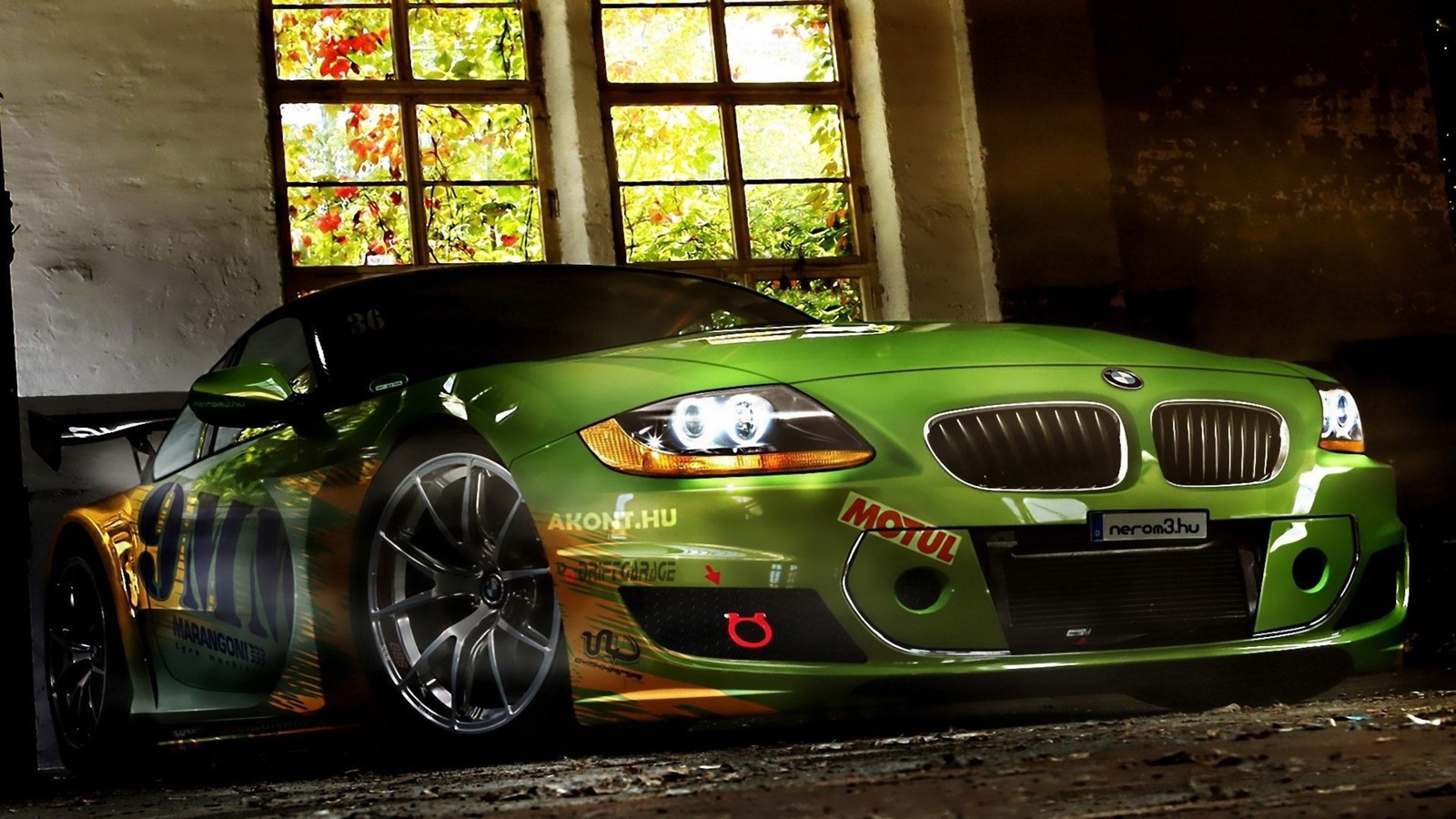 A close up of a green car parked in a garage (bmw m3, green, bmw, personal luxury car, bmw x1)