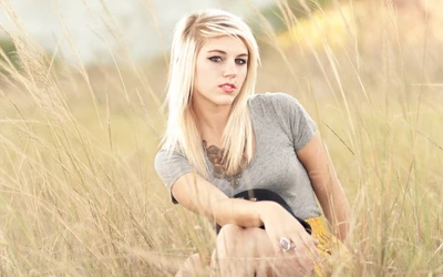 Blond Girl Posing in Tall Grass