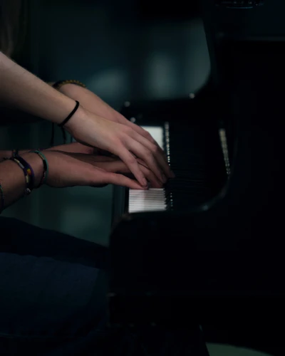 Hands of a Pianist Gracefully Playing Jazz