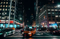 Vibrant Nighttime Traffic in a Downtown Metropolis