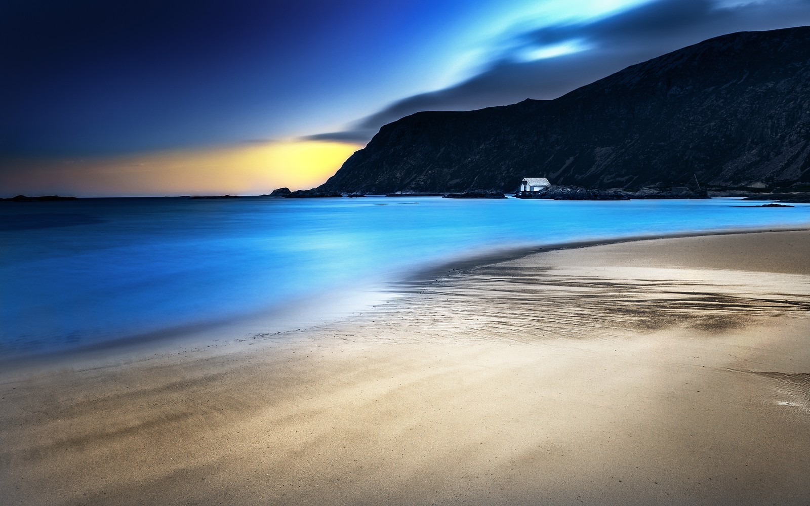 Arafed view of a beach with a house on the shore (grotlesanden beach, norway, coastal, landscape, long exposure)