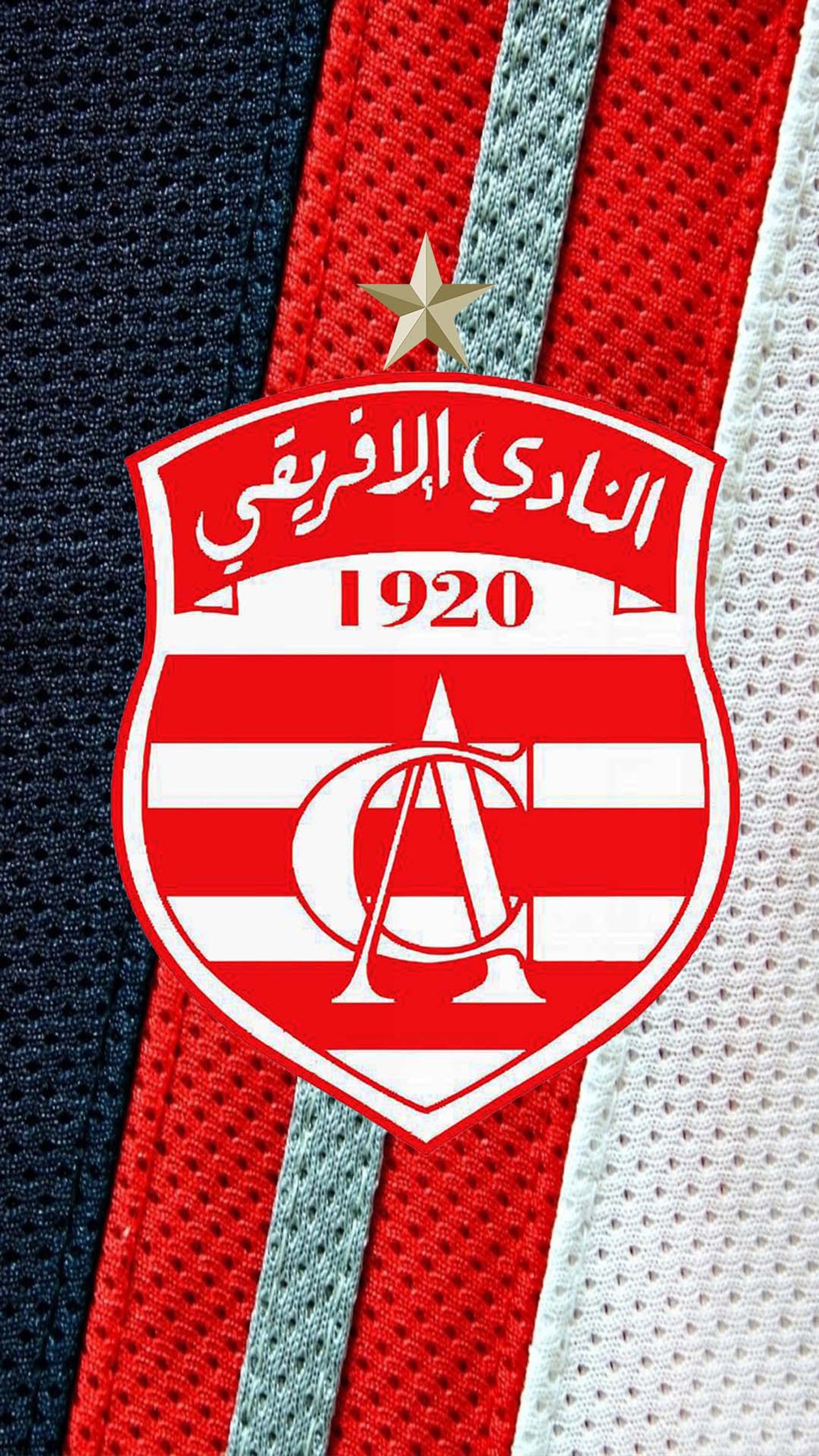 Um close de uma gravata listrada vermelha e branca com uma estrela (ca, club africian, clubafricain, clubista, clubiste)