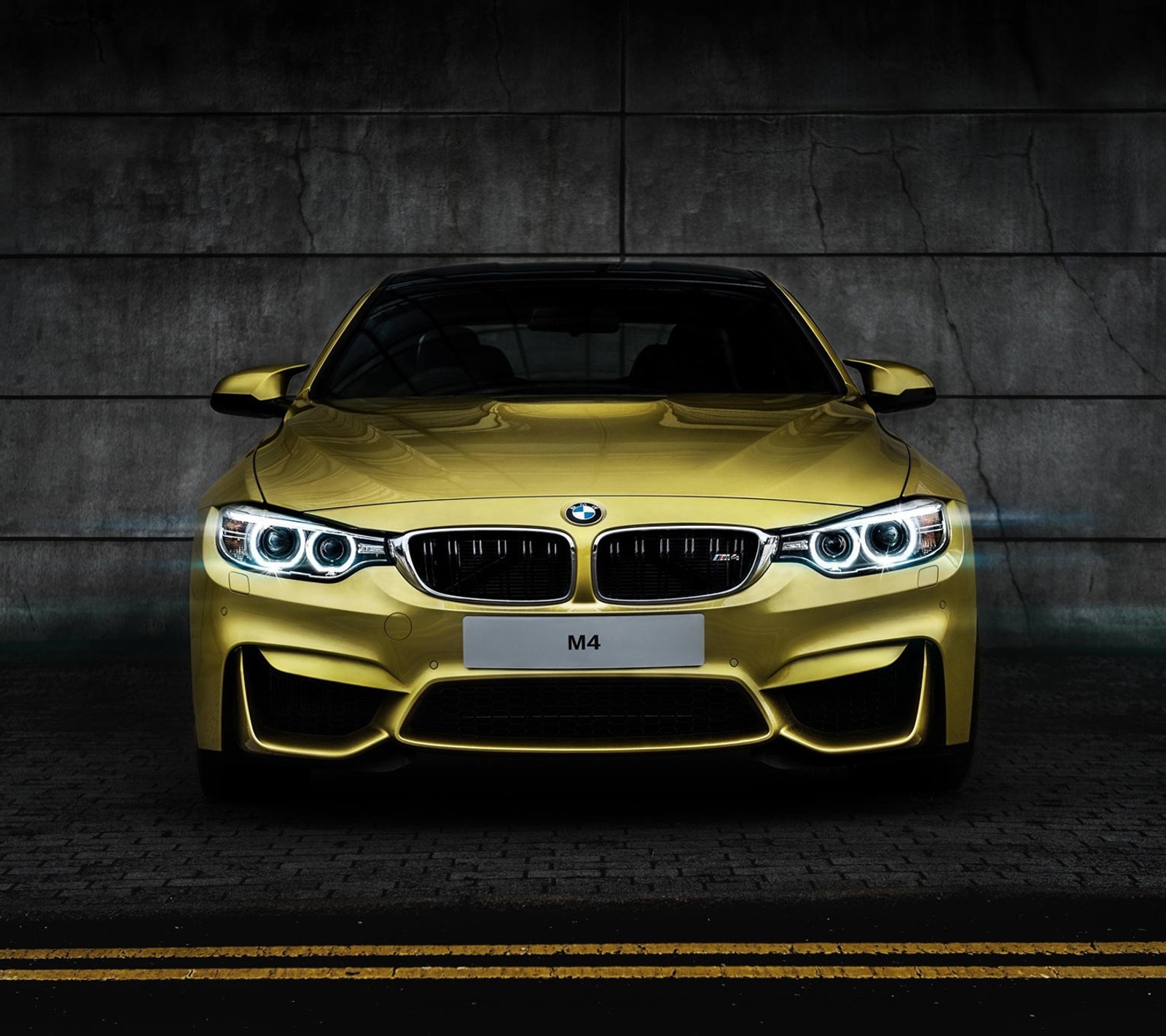 A close up of a yellow bmw car parked in a parking lot (bmw, coupe, f82, front view, m power)