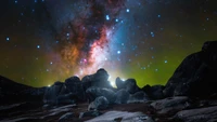 Starry Night Sky Over Majestic Rocks