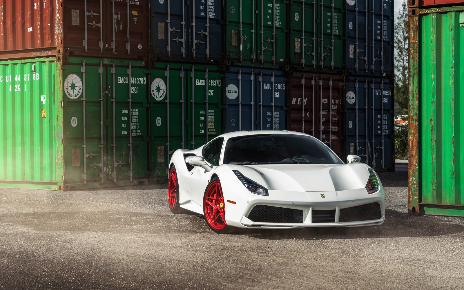 A white sports car parked in front of a shipping container (ferrari 488, ferrari 458, sports car, car, ferrari)