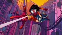 Spider-Man soars through a vibrant cityscape in 'Across the Spider-Verse'